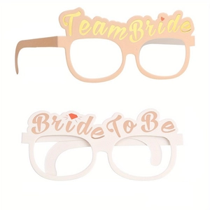Pink and white paper party glasses set with Team Bride and Bride To Be gold lettering