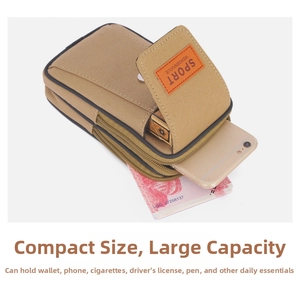 Detail showing the large capacity and multiple compartments of this khaki canvas waist bag
