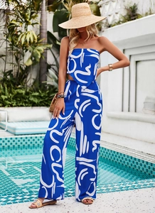 Detail of blue bohemian set featuring strapless top and high-waisted wide-leg trousers