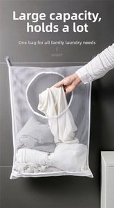 Detail of hanging white mesh laundry bag with large capacity and bottom zipper closure