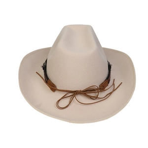 Detail of beige felt cowboy hat featuring brown leather band and thin string bow decoration