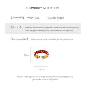 Detail showing red enamel finish and 3.5g weight specifications for copper ring