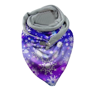 Detail view of winter scarf with snowflake print, purple gradient and metal button closure