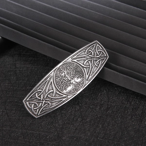 Detailed close-up of vintage Tree of Life alloy hair clip with Celtic knot patterns
