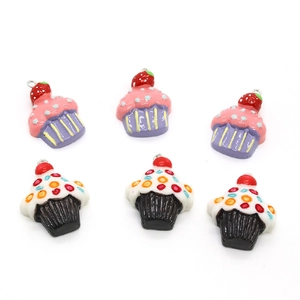 Detailed view of colorful resin fruit cupcake charms for DIY jewelry and earrings
