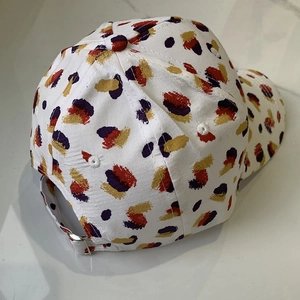 Abstract colorful print baseball cap with adjustable metal buckle on white background