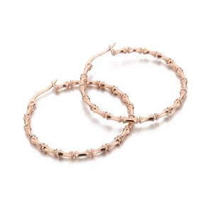 Elegant rose gold bamboo joint hoop earrings in polished titanium steel for women