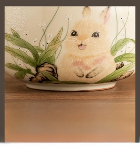 Detail of Ru Kiln rabbit tea canister showing smooth, unglazed polished bottom base