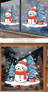 Detailed view of Christmas window stickers featuring cute snowmen and festive trees