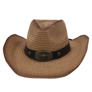 Classic straw panama cowboy hat with leather band, steer buckle, and star studs decor