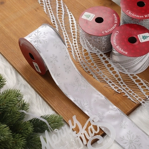 Christmas sheer mesh ribbon with silver snowflake print and festive holiday tree decor