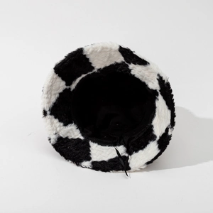 Plush checkerboard bucket hat with black and white grid pattern and interior drawstring
