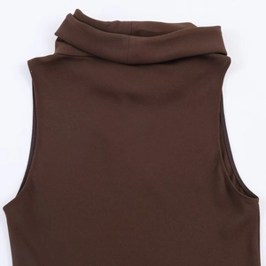 Close-up detail of dark brown high neck sleeveless top with textured fabric and stitching