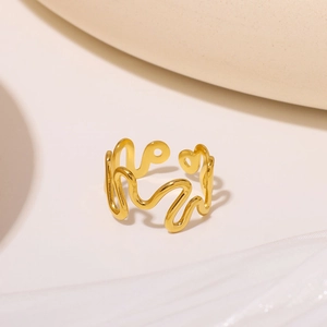 Minimalist wave-shaped 18K gold plated stainless steel ring with a smooth metallic finish