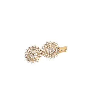 Golden rhinestone duckbill hair clip with double circular design on a white background