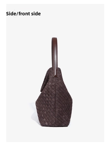 Side view of dark brown woven leather tote bag showing textured finish and thickness