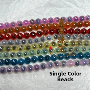 Macro view of multi-colored sugar heart agate beads showing natural core patterns