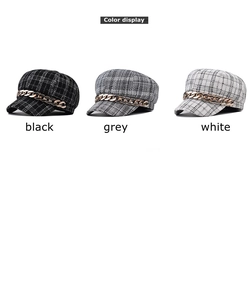 Detailed comparison of black, grey and white plaid newsboy caps with gold chains