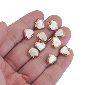 Nine 11mm heart shell charms with gold stainless steel edges for DIY jewelry necklaces