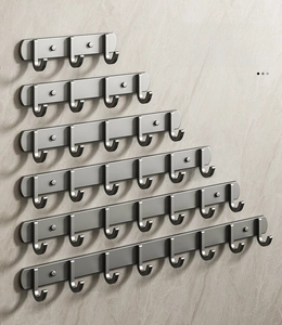 Detail of dark grey matte adhesive wall hooks in multiple sizes from 3 to 8 hooks