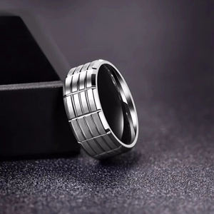 Polished silver stainless steel ring for men with textured grid pattern engraving