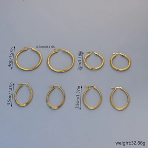 Set of gold stainless steel hoop earrings in various sizes and geometric round shapes