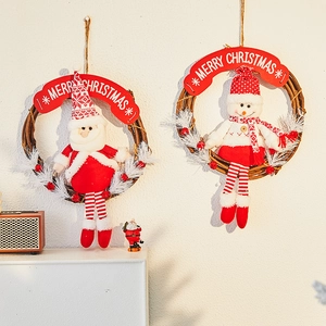 Christmas wreath door hangers with Santa and Snowman figures on natural rattan rings