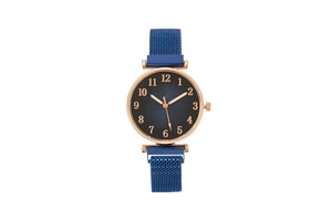Detail of blue Milanese mesh magnetic strap with rose gold case on women's quartz watch