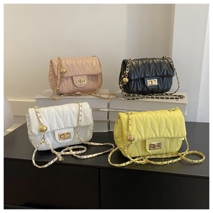 Quilted crossbody bag with gold chain strap in pink black white and yellow leather colors
