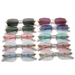 Frameless rimless polygon sunglasses collection in ten gradient colors with metal accents