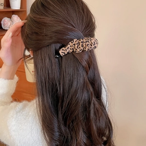 Leopard print fabric banana clip for back of head styling on long curly hair