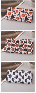 Detailed view of Halloween PU leather wallets featuring pumpkin and black cat prints