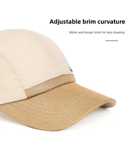Detail of a mesh sun hat featuring a foldable wide brim and patchwork fabric design