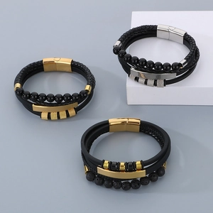Detailed macro of multi-layer leather bracelets with volcanic stone and magnetic clasp