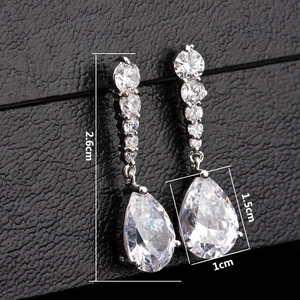 Silver teardrop tassel earrings with cubic zirconia stones measuring 2.6cm in length