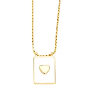Golden square pendant necklace featuring a raised heart motif on a box chain for women