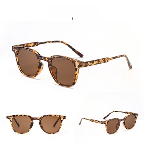 Detail view of round tortoiseshell sunglasses SS0051 with vintage brown lenses and rivets