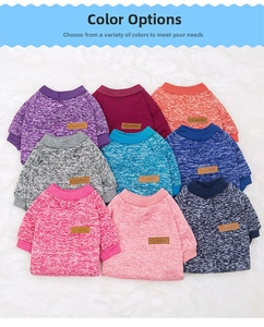 Close-up of colorful pet sweaters with classic leather patch and ribbed cuffs textures