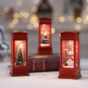 Christmas red telephone booth table lamp with Santa, snowman and tree figurines