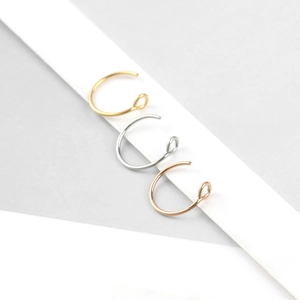 Three-piece stainless steel piercing rings set in gold, silver and rose gold colors