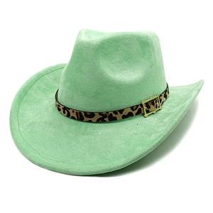 Detail of mint green suede cowboy hat with leopard print band and golden metal buckle