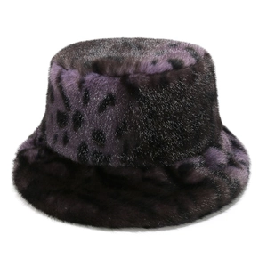 Detail of purple leopard faux fur bucket hat showing soft plush texture and pattern