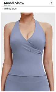 Detail of smoky gray blue yoga vest with V-neck halter design and ruched side texture