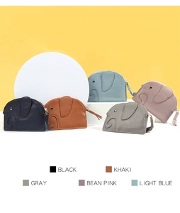Close-up of elephant shaped leather coin purses in multiple colors with pebbled texture