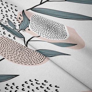 Close-up of soft flannel tapestry fabric showing modern abstract art print and texture