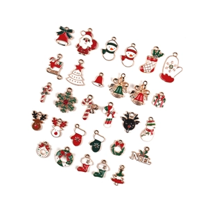 Assorted Christmas alloy charms with Santa, deer, and snowflakes on white background
