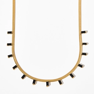 Golden snake chain necklace with emerald green zircon tassels in geometric steel design
