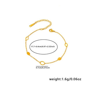 Detail of gold stainless steel bracelet showing delicate oval links and sizing dimensions