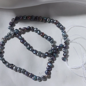 Polished black baroque freshwater pearls with iridescent sheen for jewelry DIY
