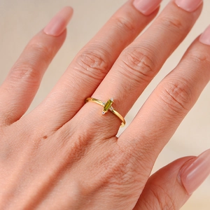 S925 sterling silver ring featuring a rectangular olive green zircon on female hand